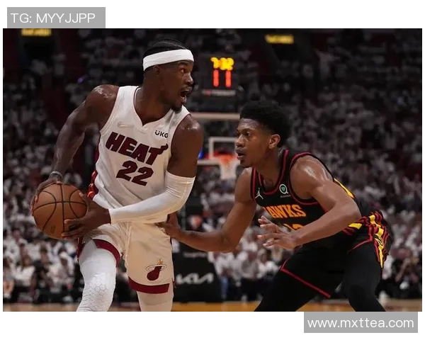热火与马刺激战正酣NBA季后赛精彩对决引发球迷热议